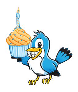 Graphic of a blue bird holding a cupcake