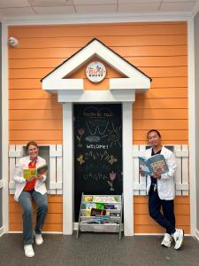 Dr. Bird and Dr. Yang in front of a chalkboard