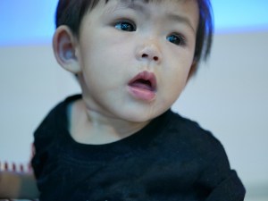 Photo of a toddler with their mouth open