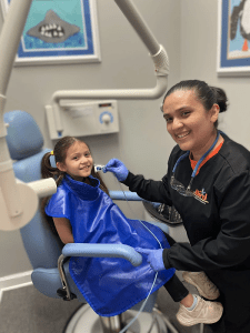 Office staff member with a patient