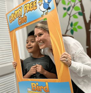 Dr. Bird with a patient
