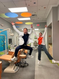 Dr. Bird and Dr. Yang jumping