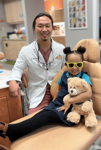 Dr. Yang with a patient