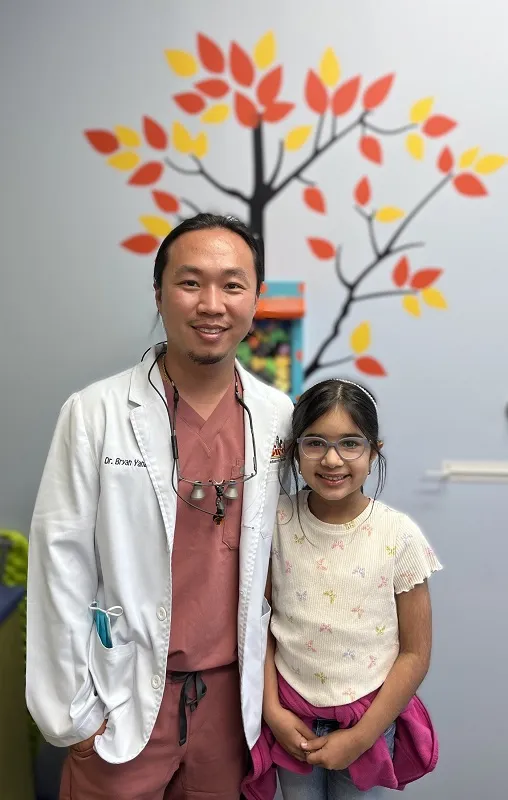 Dr. Yang with a patient